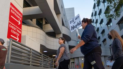 Protesters against ICE march at Glendale Memorial Hospital in Glendale, California.
