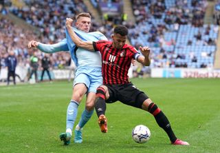 Lloyd Kelly has captained Bournemouth to promotion