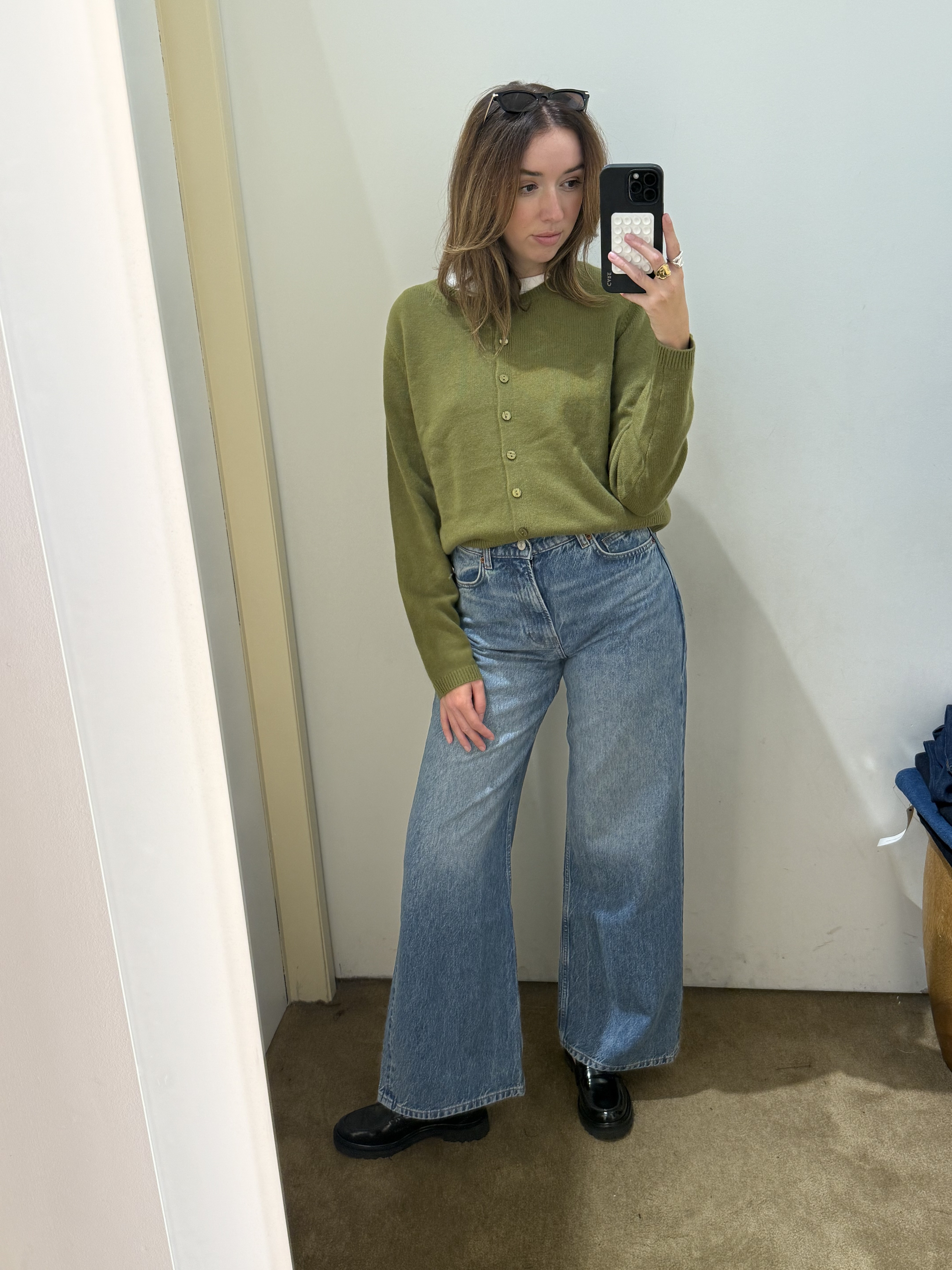 Social media editor, Megan, wears the Reformation Clara cardigen, jeans and loafers