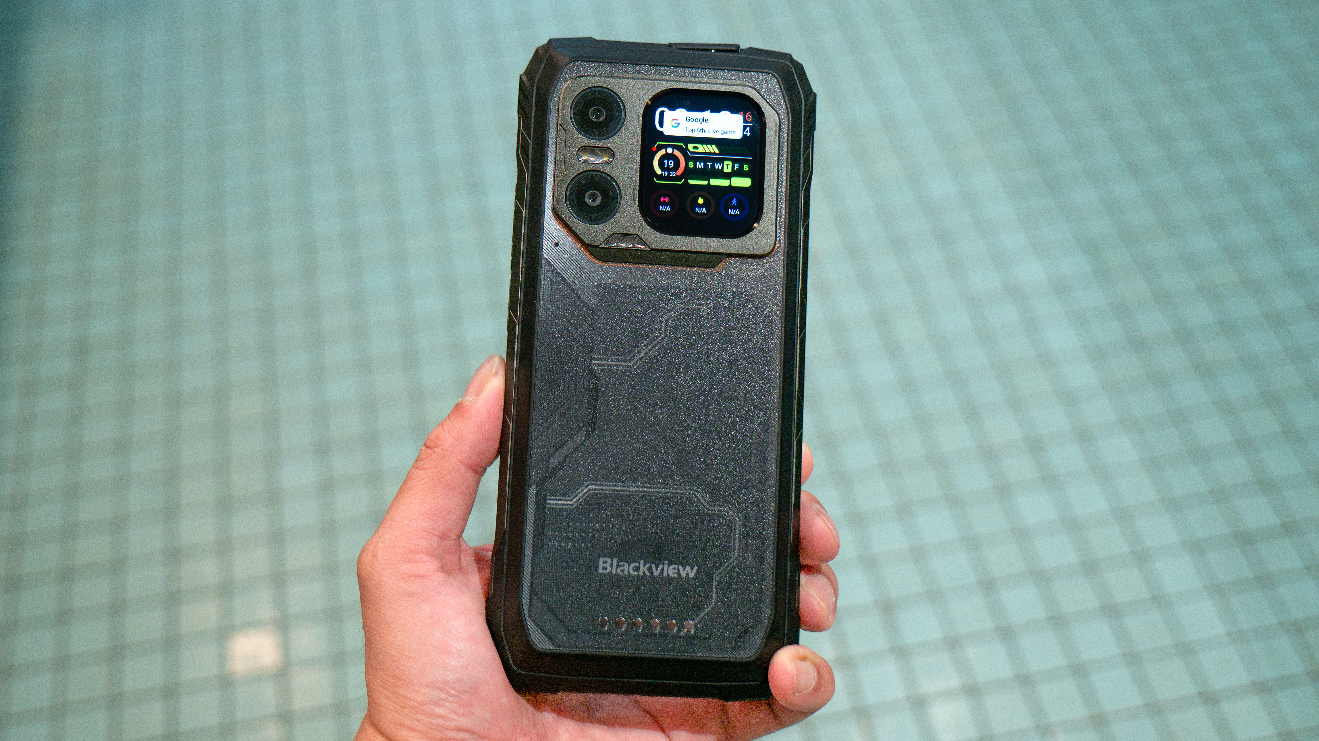Blackview Xplore 1 Walkie Talkie held in the hand showing its cameras.
