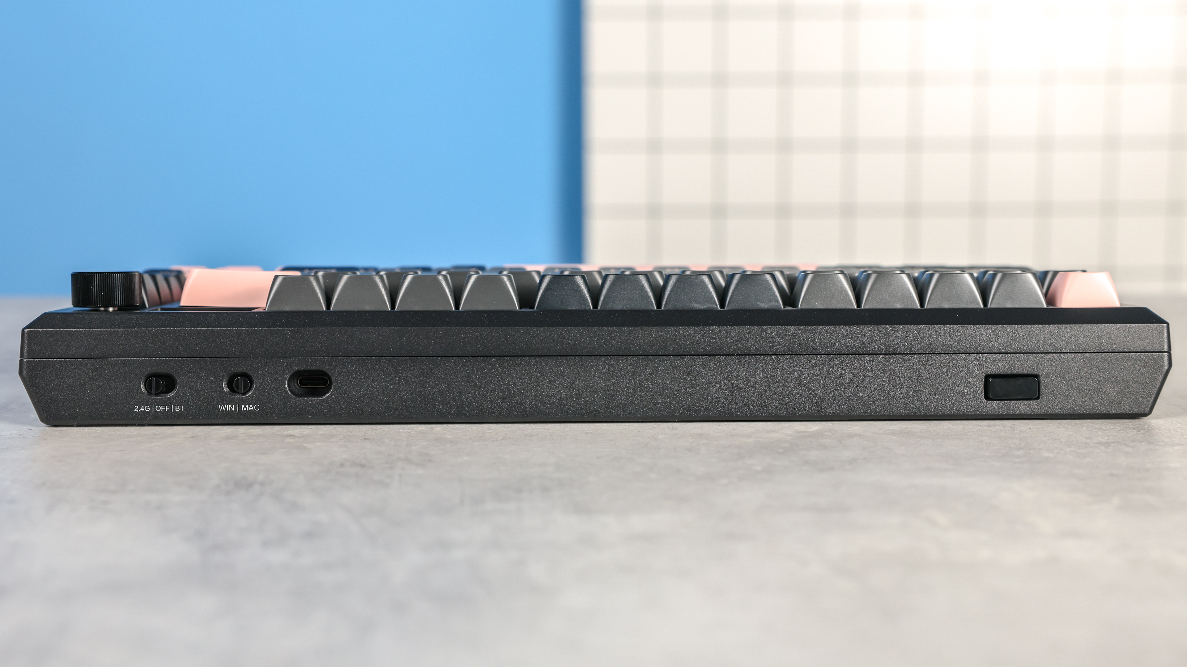 Redragon Eclipse K720 Pro photographed in front of a blue background.
