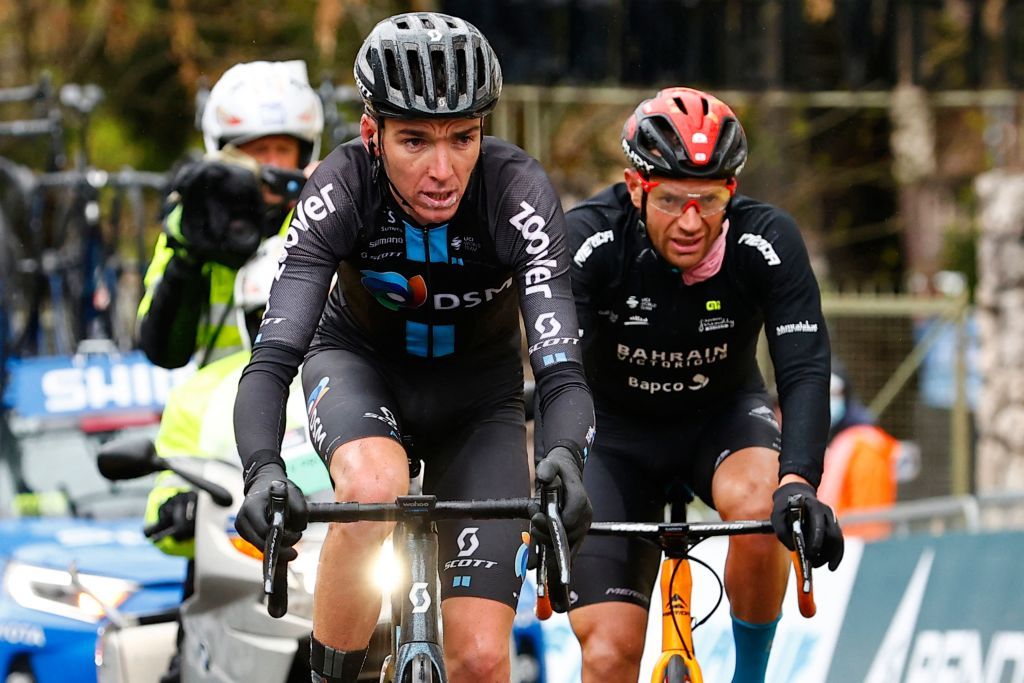 Romain Bardet (DSM) rides ahead of Damiano Caruso (Bahrain Victorious) on the Passo Giau