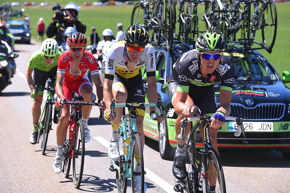 Vegard Breen leads the early breakaway during stage 16