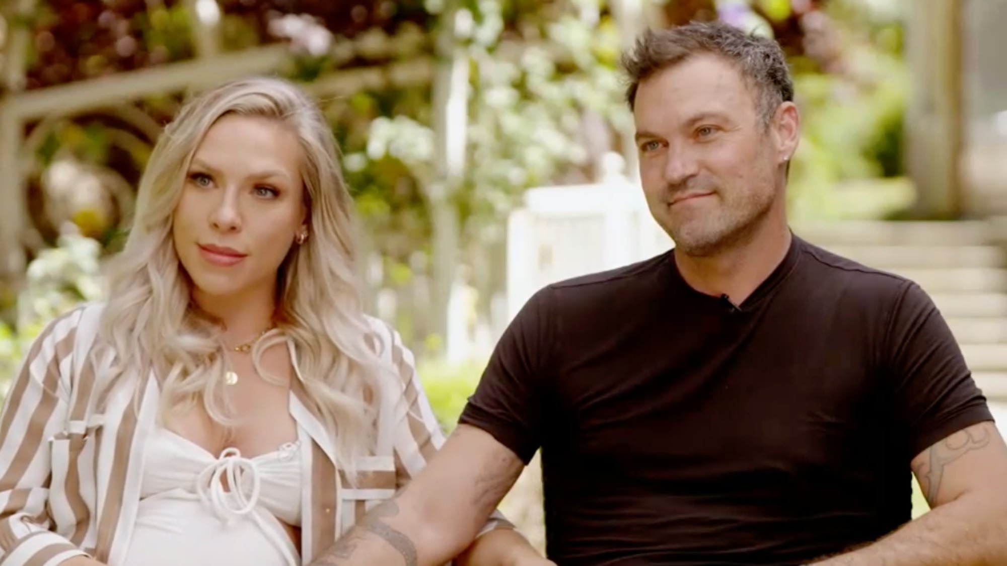 Sharna Burgess and Brian Austin Green sitting next to each other for an interview for Good Morning America.