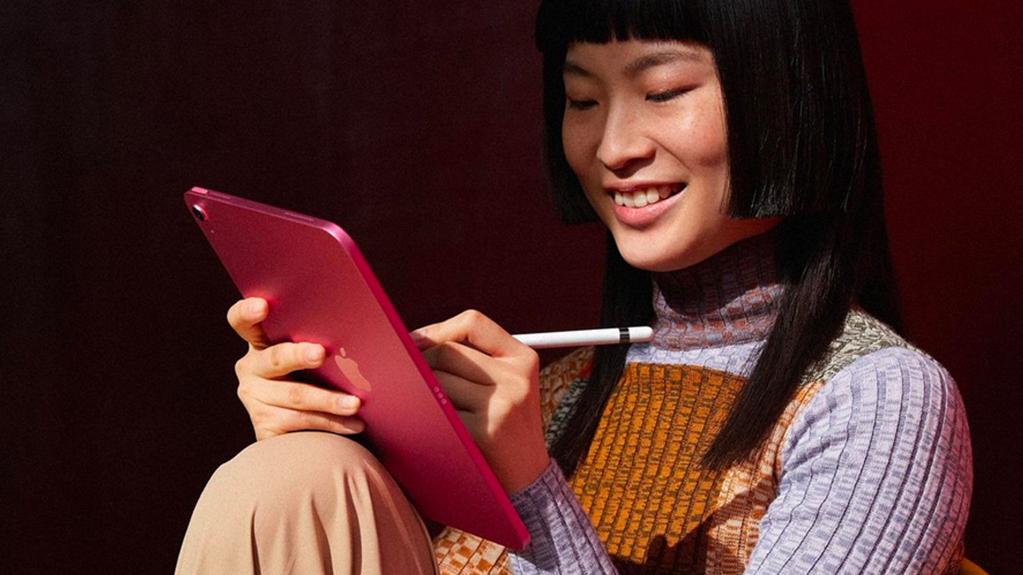 A girl uses an iPad