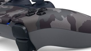 PS5 Gray Camouflage Collection; a close up of a DualSense controller