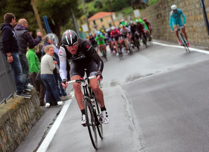 Gregory Rast (Trek Factory Racing) attacked on the Poggio