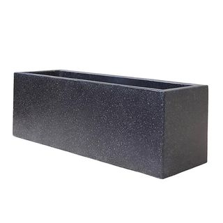 rectangular trough container with white speckles on a white background