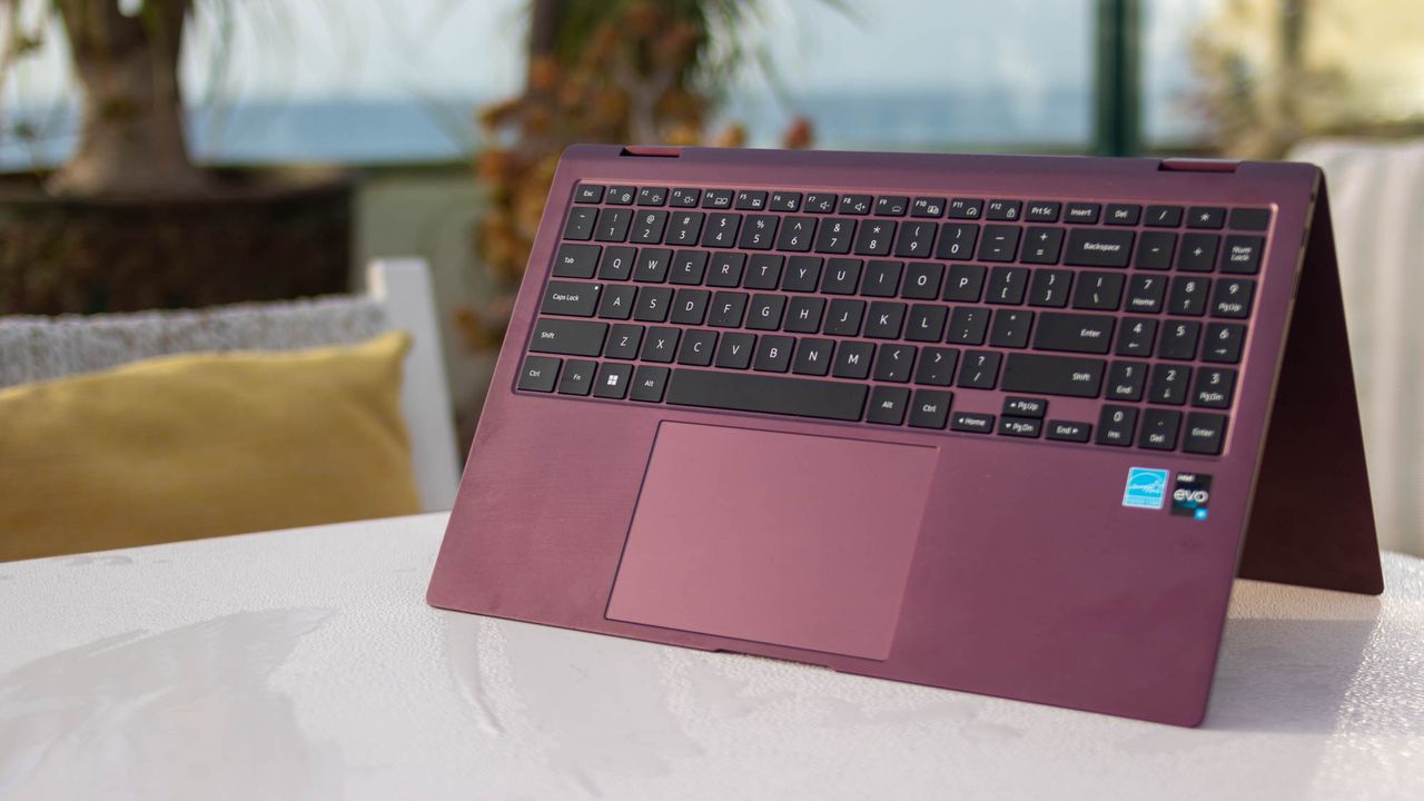 A photograph of the Samsung Galaxy Book2 Pro 360's keyboard in tent mode on a table