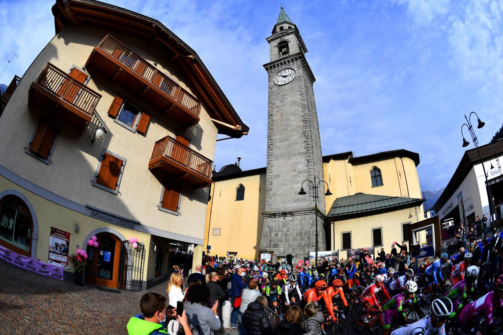 LAGHI DI CANCANO ITALY OCTOBER 22 Start Peloton Piazza San Giacomo Pinzolo City Public Fans Team Presentation Landscape during the 103rd Giro dItalia 2020 Stage 18 a 207km stage from Pinzolo to Laghi di Cancano Parco Nazionale dello Stelvio 1945m girodiitalia Giro on October 22 2020 in Laghi di Cancano Italy Photo by Stuart FranklinGetty Images