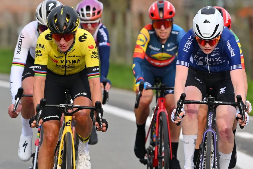 WAREGEM BELGIUM MARCH 27 LR Marianne Vos of The Netherlands and Team VismaLease a Bike and Puck Pieterse of The Netherlands and Team FenixDeceuninck compete in the breakaway during the 12nd Dwars door Vlaanderen 2024 Womens Elite a 1299km one day race from Waregem to Waregem on March 27 2024 in Waregem Belgium Photo by Luc ClaessenGetty Images