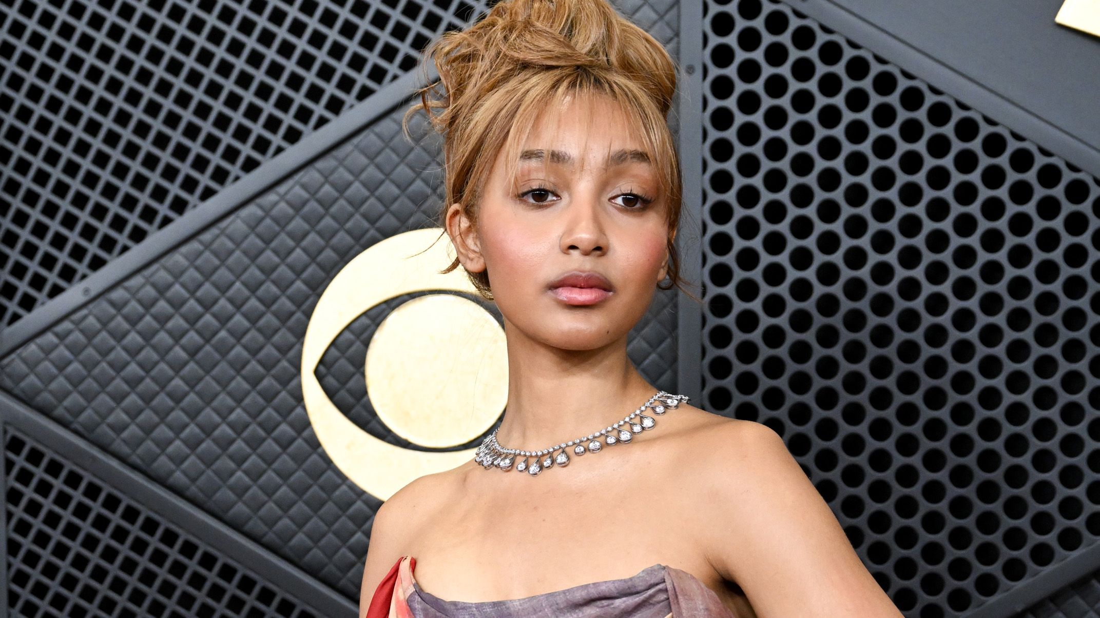 "Quite literally, I did not have a microphone, but I had a karaoke game on the Nintendo Wii and they gave you a mic": PinkPantheress becomes the first woman to win Producer of the Year at the BRIT Awards