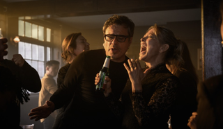 Nicola Walker and Jemaine Clement singing into a beer bottle in Alice and Steve.