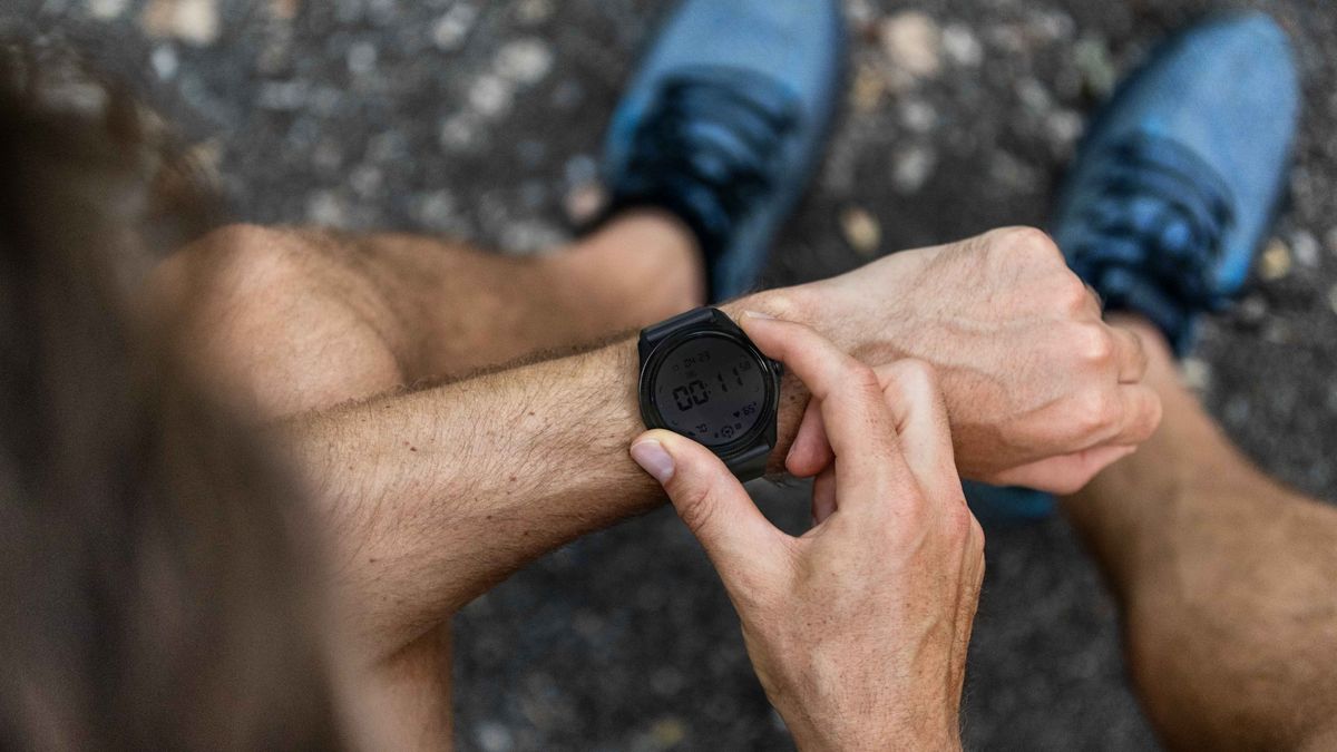 Man checking time on TicWatch Pro 5 Enduro