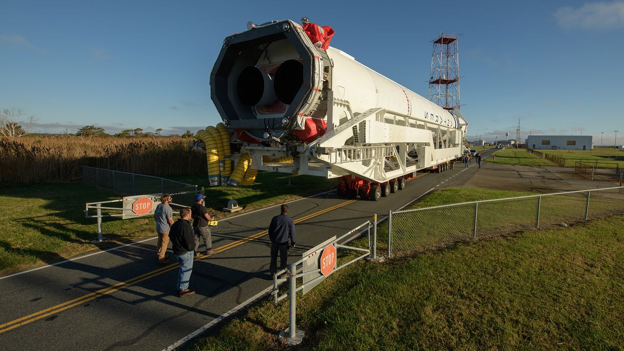 A Northrop Grumman Antares rocket is seen as it rolls out to Pad-0A, Tuesday, Oct. 29, 2019, at NASA's Wallops Flight Facility in Virginia.