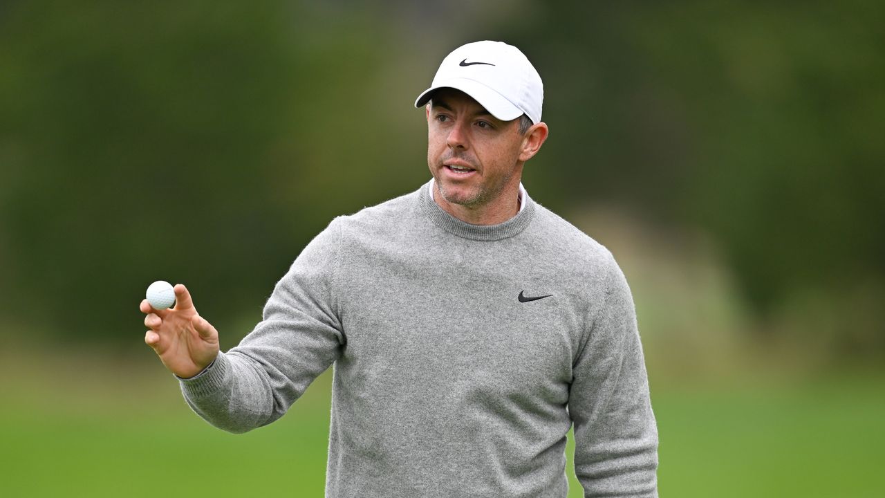 Rory McIlroy holds up his ball to the crowd at the 2025 Pebble Beach Pro-Am