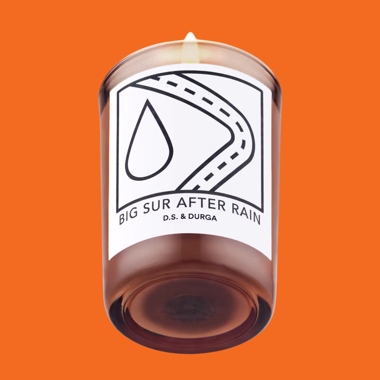 A brown glass candle 