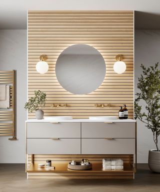 bathroom with wood effect panelled wall feature with double vanity unit with drawers and shelf below, mirror and wall lights