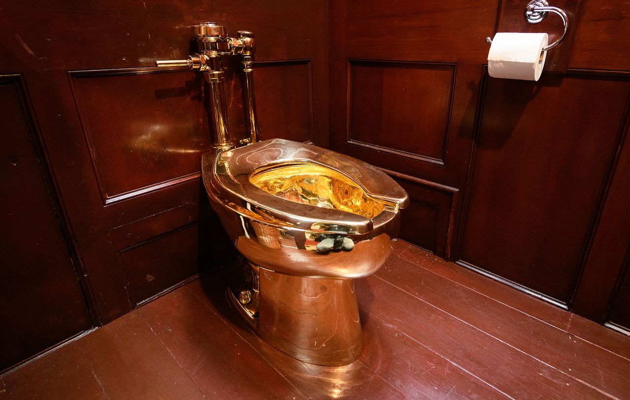 &quot;America&quot;, a fully-working solid gold toilet, created by artist Maurizio Cattelan, is seen at Blenheim Palace on September 12, 2019 in Woodstock, England. The Italian artist is known as the prankster of the art world.