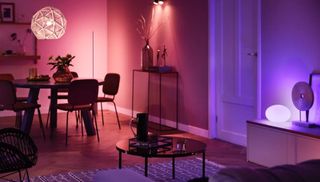 Room lit with pink and purple Philips Hue lights