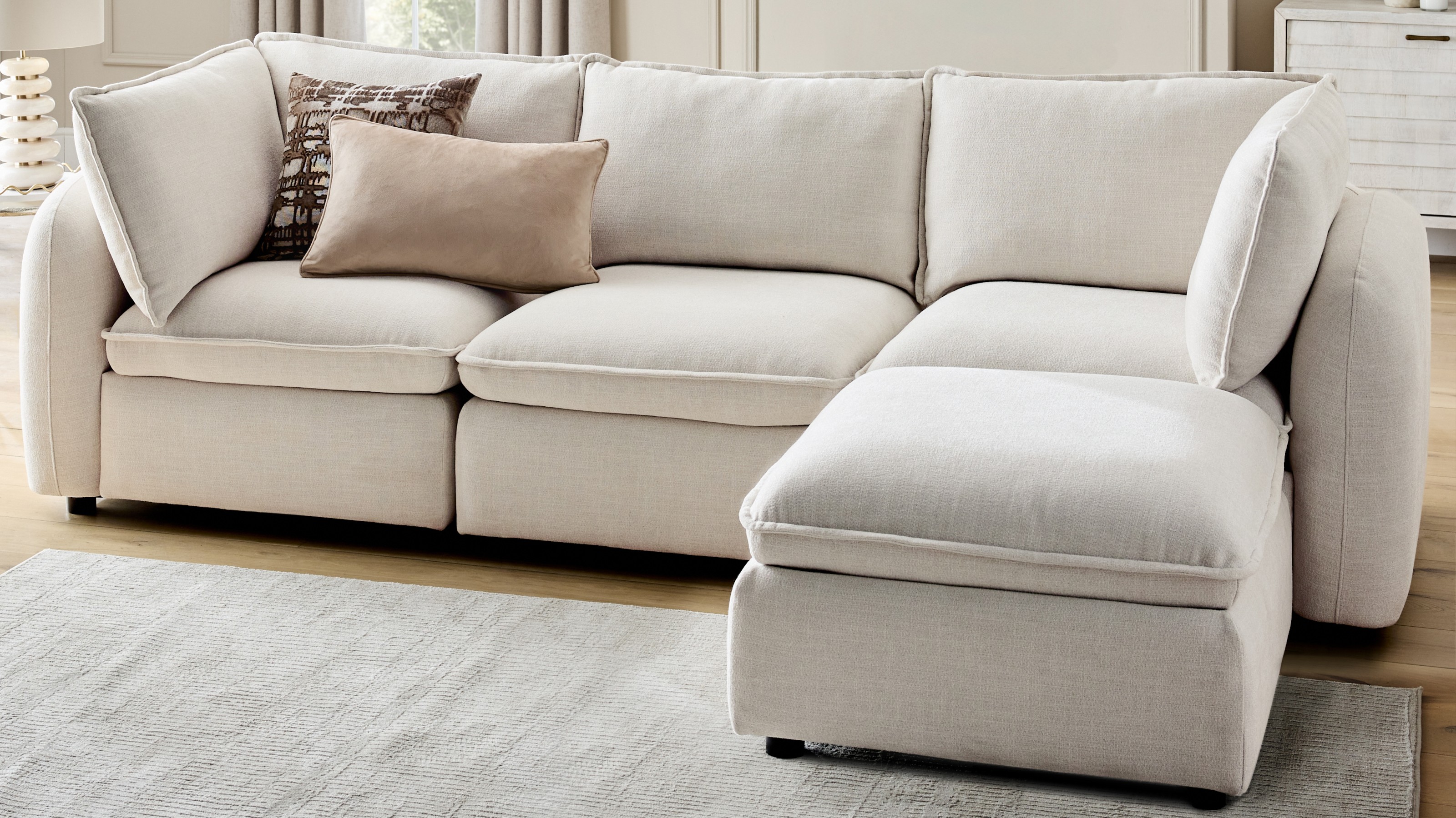 Next Crosby modular storage sofa in oyster in a living room