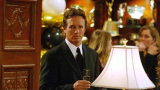 Linden Ashby as Cameron Kirsten holding champagne in The Young and the Restless