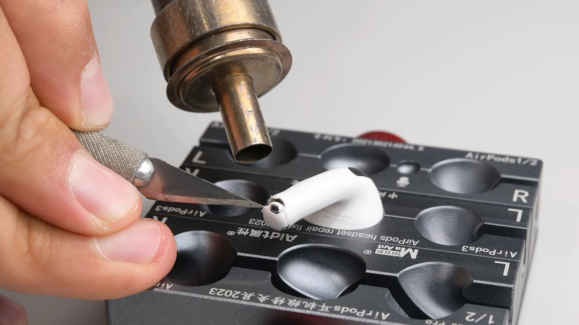 An iFixit teardown of the Apple AirPods 5 earphones.