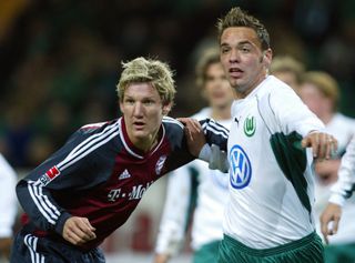 A young Bastian Schweinsteiger in action for Bayern Munich against Wolfsburg in 2003.