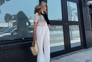A woman with minimal style wearing linen clothing.