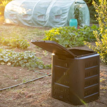 Compost bin in garden
