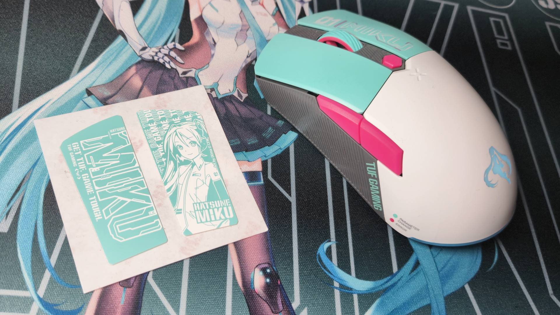Photo by Rosalie Newcombe of the TUF Gaming Hatsune Miku gaming mouse.