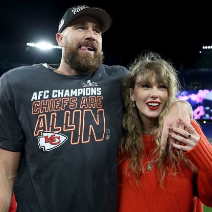 Taylor Swift and Travis Kelce attend a Kansas City Chiefs game