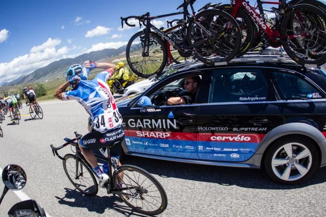 Caleb Fairly (Garmin Sharp) goes for bottles on stage 3 of the USA Pro Challenge from Gunnison to Monarch Mountain