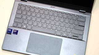 Angled photo of the Acer Swift 14 AI (Intel) keyboard and touchpad from above