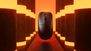 Pulsar TenZ wireless gaming mouse on an orange background