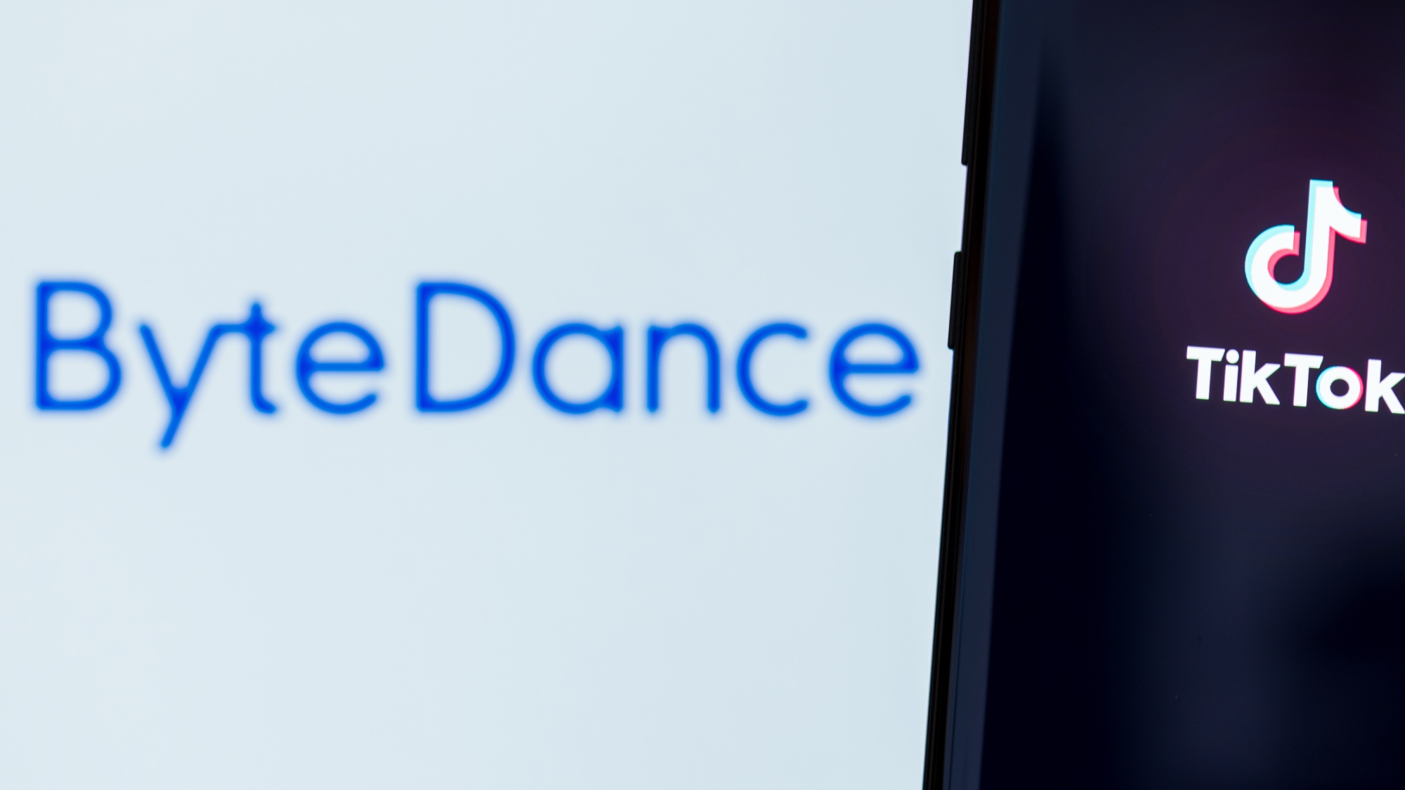 ByteDance Logo next to TikTok logo on phone