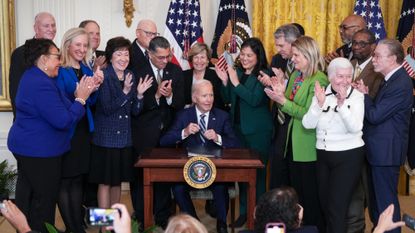 President Joe Biden signs the Social Security Fairness Act