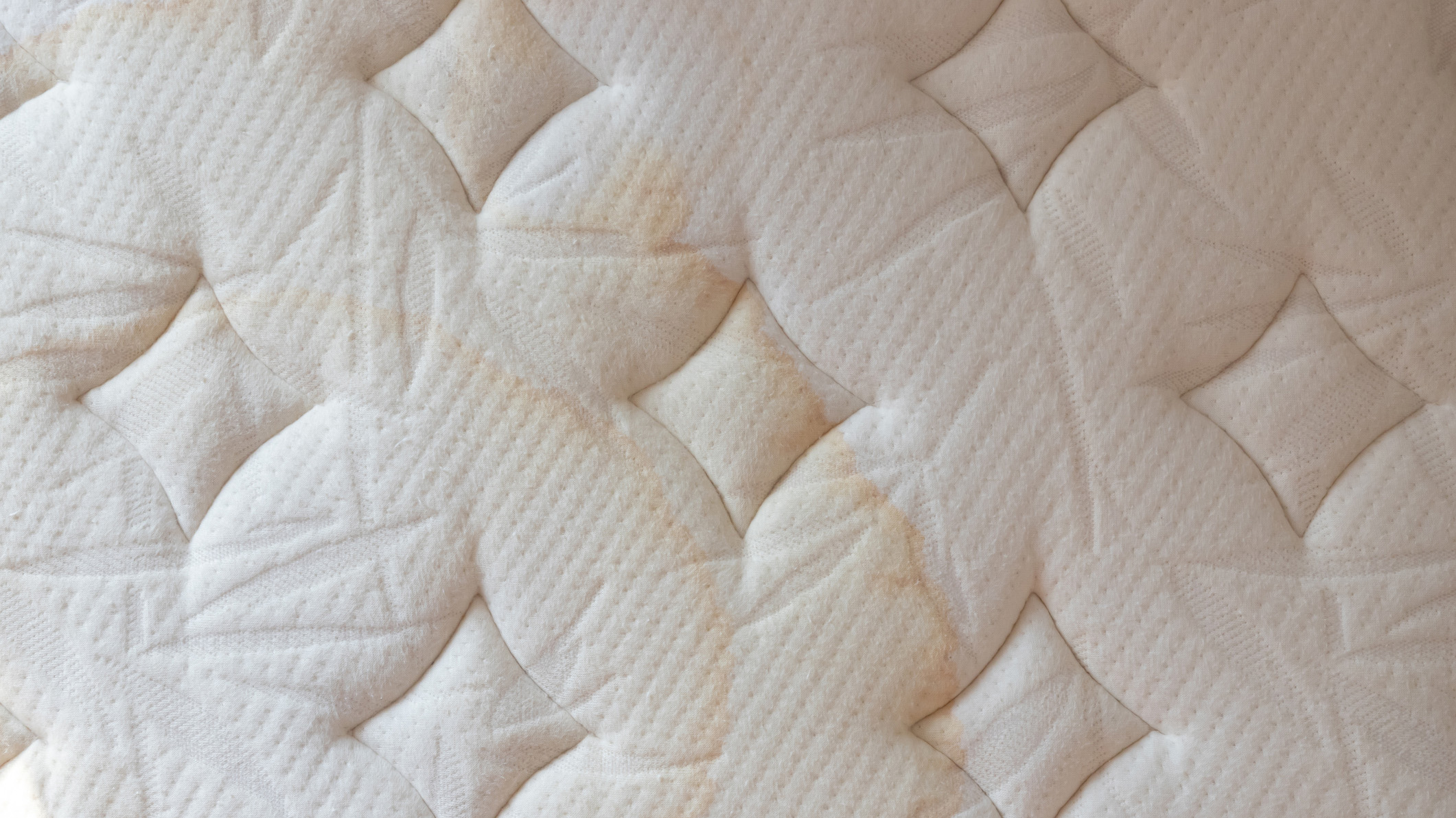 This is why your mattress has yellow stains — and how to remove them