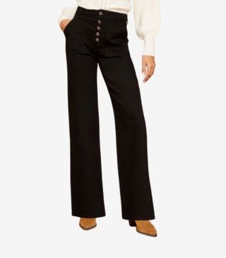 Image of black flared jeans 