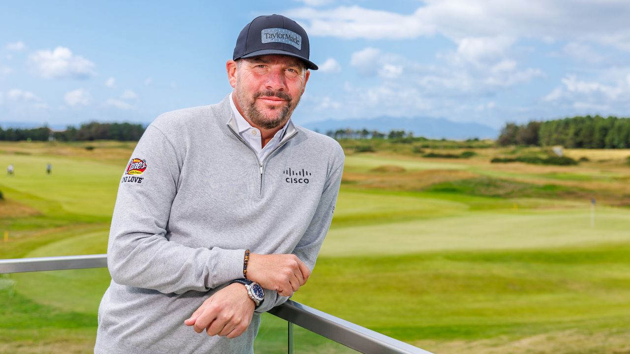 Michael Block poses for a photo on the Dundonald Golf Links balcony