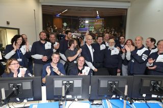 SpaceIL and Israel Aerospace Industries team members celebrate the successful arrival of the Beresheet lunar lander in orbit around the moon on April 4, 2019.