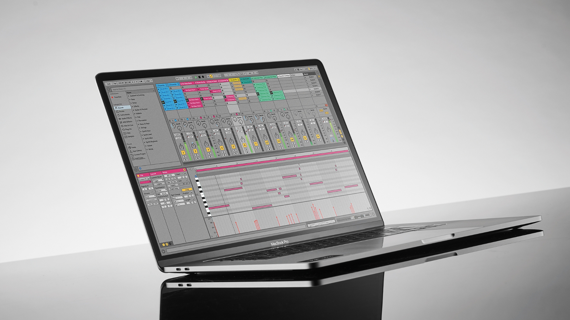 A MacBook Pro on a desk with Ableton running on it