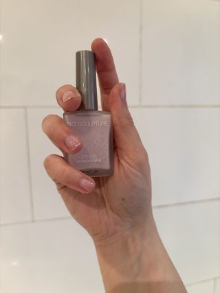 Mica Ricketts holding Bio Sculpture Ethos Lavender Base