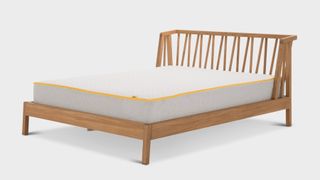 Eve Premium Hybrid Mattress on a wooden bed frame