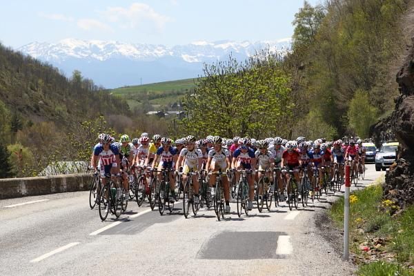 The peloton heads out of Osseja.