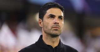 Arsenal manager Mikel Arteta looks on during the UEFA Champions League match between Sevilla FC and Arsenal FC at Estadio Ramon Sanchez Pizjuan on October 24, 2023 in Seville, Spain.