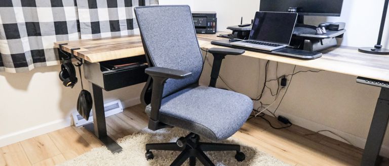 The Vari Task Chair in front of a desk