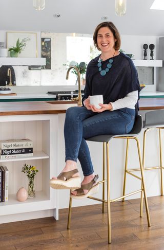 A ground floor extension gave Julie and James the chance to create their dream kitchen, with a vaulted ceiling and bold but sophisticated Shaker-style units