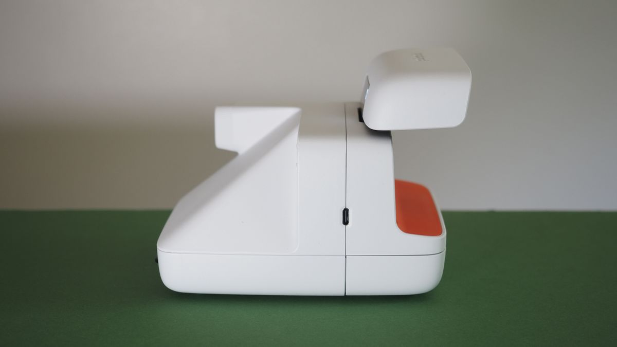 Polaroid Flip camera on a green surface