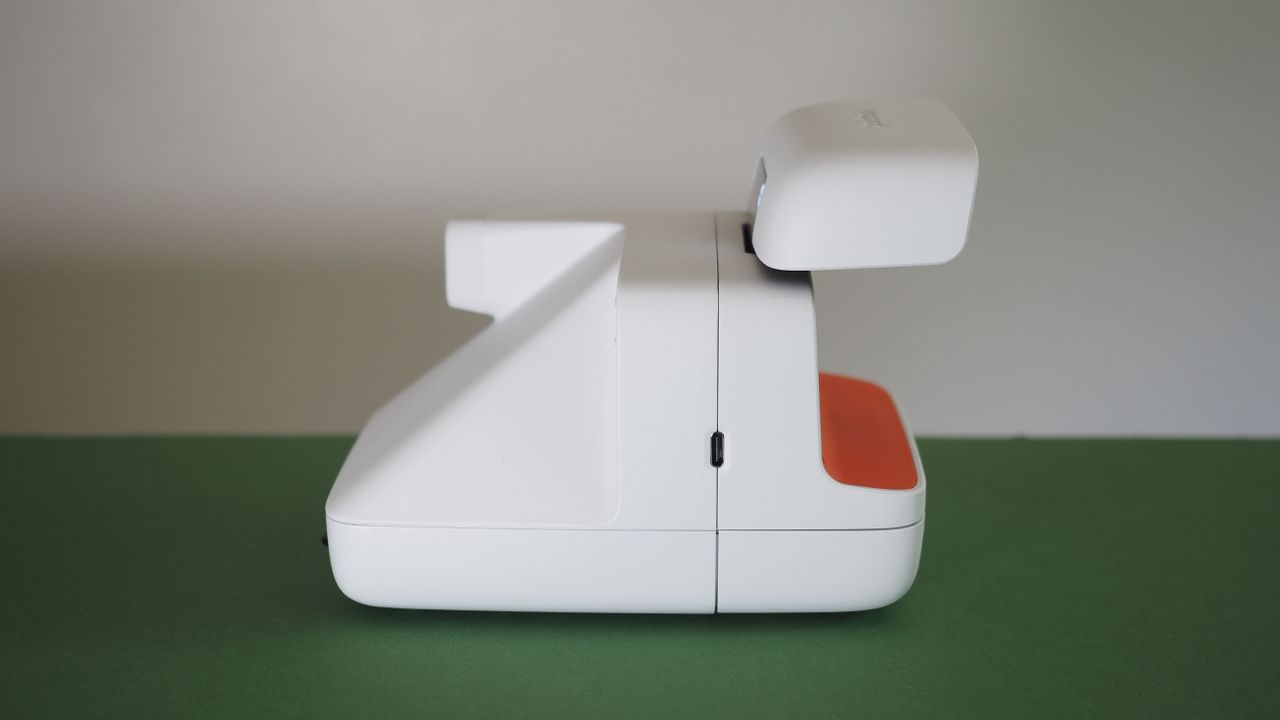 Polaroid Flip camera on a green surface